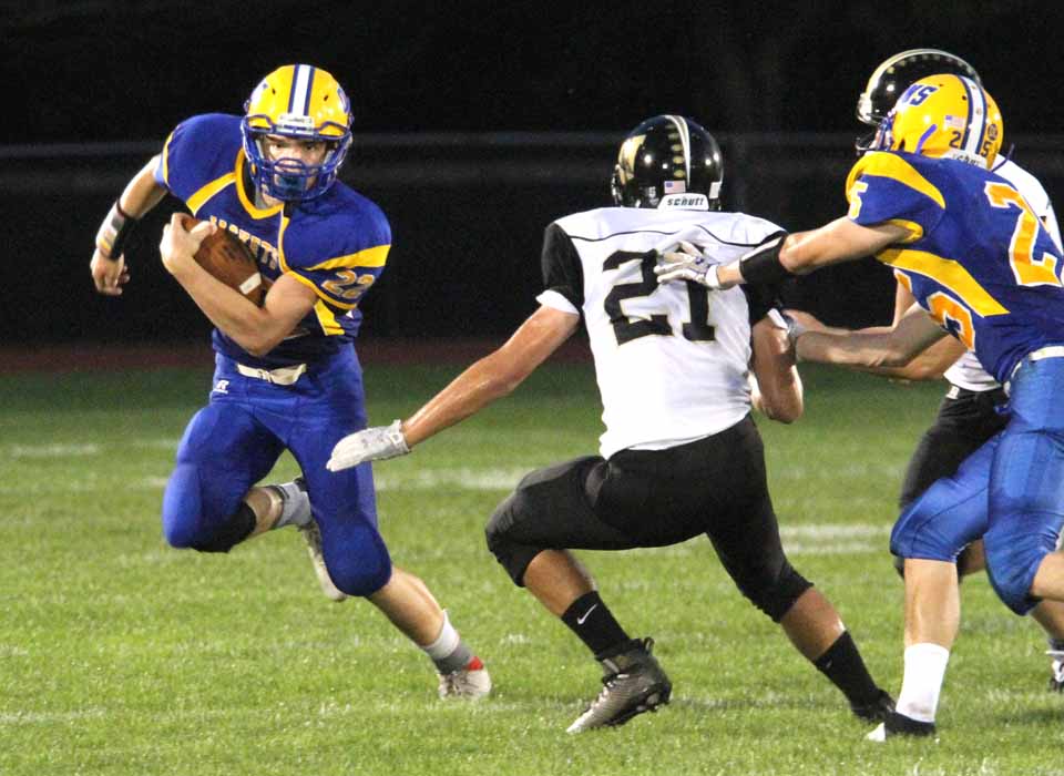 OHS's Mariano Hernandez returns a kickoff as teammate Jackson Mushtare tries to get a block on Windsor's Jackson White. The Yellowjackets lost Friday's home non-conference game against the Black Knights, 69-20. (Cheryl Clough/AllOTSEGO.com)