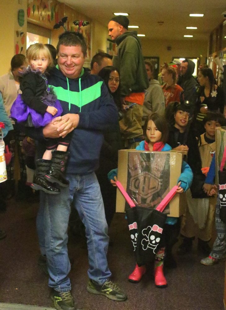 The halls of SUNY Oneonta we filled with all manor of ghoul, ghost and goblin as hundreds of children and their families came out for the annual Halloween in the Halls at SUNY Oneonta. After carnival in the Hunt Union, groups went around to the dorms where there could play games, make Halloween crafts, go though a haunted house, and of course, get candy! Here, Dan St. Onge holds his daughter Novalei, Oneonta, next to Ciara Kaltenback, Ave Barber and Ryna Barber of Cooperstown. (Ian Austin/AllOTSEGO.com)